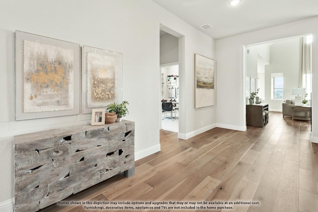 411 Atlas Cedar Dr, Glenn Heights, TX 75154 - hallway featuring wood finished floors and baseboards