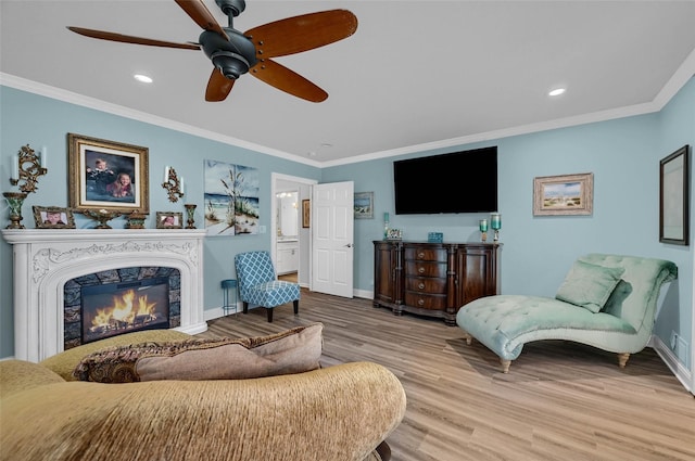 1016 Crestview Dr, Sherman, TX 75092 - living area featuring wood finished floors, crown molding, a ceiling fan, recessed lighting, and a fireplace