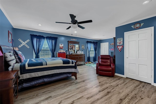1016 Crestview Dr, Sherman, TX 75092 - bedroom with multiple windows, crown molding, wood finished floors, recessed lighting, and a ceiling fan