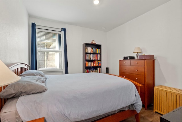 797 Hawthorn St, Princeton, TX 75407 - bedroom with wood finished floors and radiator heating unit