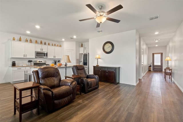 797 Hawthorn St, Princeton, TX 75407 - living area with dark wood finished floors, ceiling fan, and recessed lighting