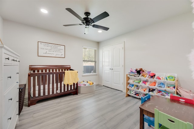 5414 Wild Oak Rd, Balch Springs, TX 75180 - bedroom featuring wood finished floors, a closet, recessed lighting, a ceiling fan, and a nursery area