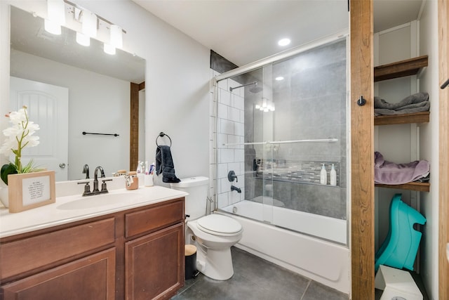 5414 Wild Oak Rd, Balch Springs, TX 75180 - full bathroom featuring toilet, vanity, tile patterned flooring, and bath / shower combo with glass door