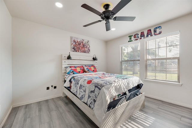 5414 Wild Oak Rd, Balch Springs, TX 75180 - bedroom featuring wood finished floors, recessed lighting, baseboards, and ceiling fan