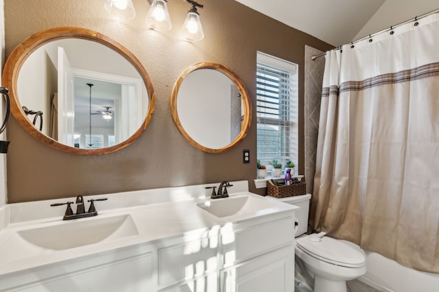 608 Ambrose St, Fort Worth, TX 76131 - bathroom featuring a textured wall, double vanity, toilet, vaulted ceiling, and shower / bathtub combination with curtain