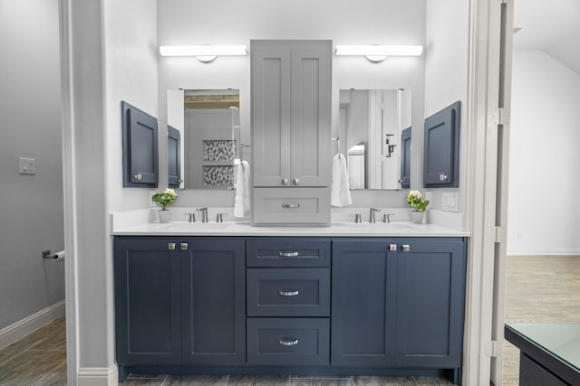 1208 Claire St, Lantana, TX 76226 - bathroom with double vanity and wood finished floors