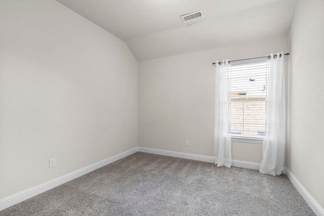 1208 Claire St, Lantana, TX 76226 - empty room featuring carpet floors and lofted ceiling