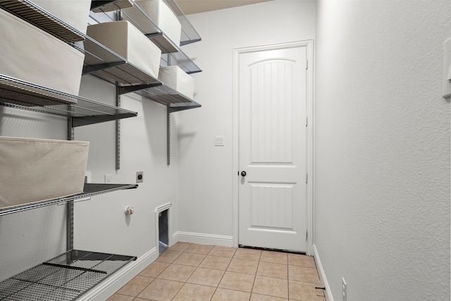 1208 Claire St, Lantana, TX 76226 - laundry room featuring hookup for an electric dryer and light tile patterned floors