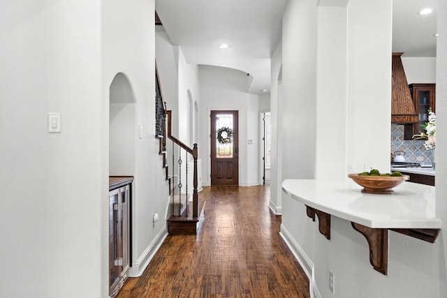 1208 Claire St, Lantana, TX 76226 - entrance foyer with dark wood-type flooring, stairway, recessed lighting, and wine cooler