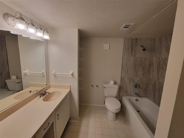 1340 Finley Dr, Plano, TX 75025 - full bath featuring toilet, vanity, tile patterned floors, a textured ceiling, and shower / washtub combination