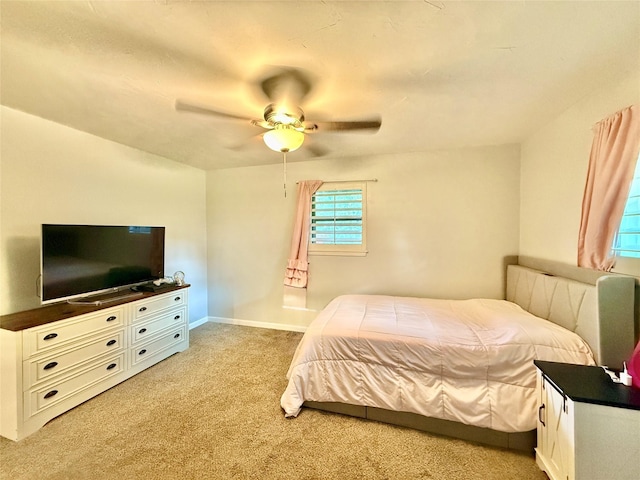 1415 Scenic Dr, Graham, TX 76450 - bedroom featuring light colored carpet and a ceiling fan