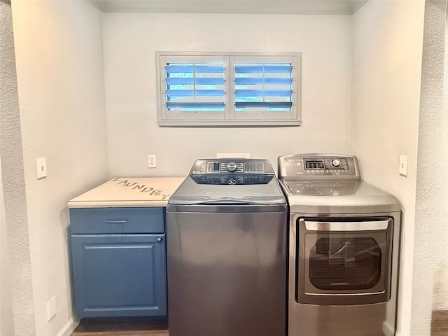 1415 Scenic Dr, Graham, TX 76450 - laundry area with washer and dryer and cabinet space