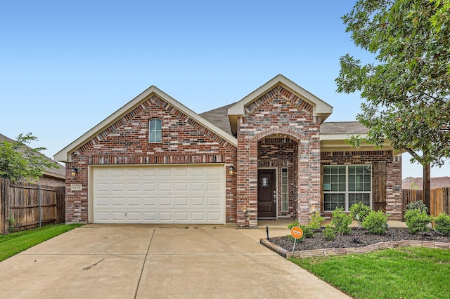 2124 Leonard Ranch Rd, Fort Worth, TX 76134 - traditional-style house with brick siding, concrete driveway, a shingled roof, and a garage