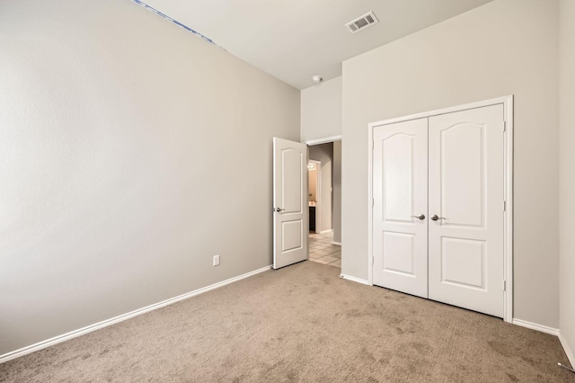 2124 Leonard Ranch Rd, Fort Worth, TX 76134 - unfurnished bedroom featuring carpet flooring, baseboards, and a closet