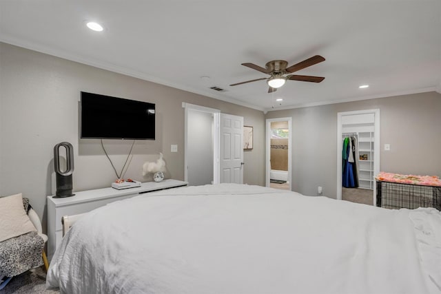 203 Olive St, Waxahachie, TX 75165 - bedroom with crown molding, a spacious closet, recessed lighting, carpet flooring, and connected bathroom