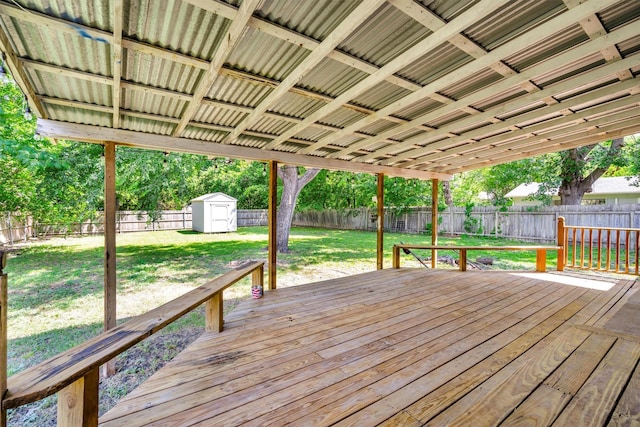 203 Olive St, Waxahachie, TX 75165 - deck with a fenced backyard and a storage shed