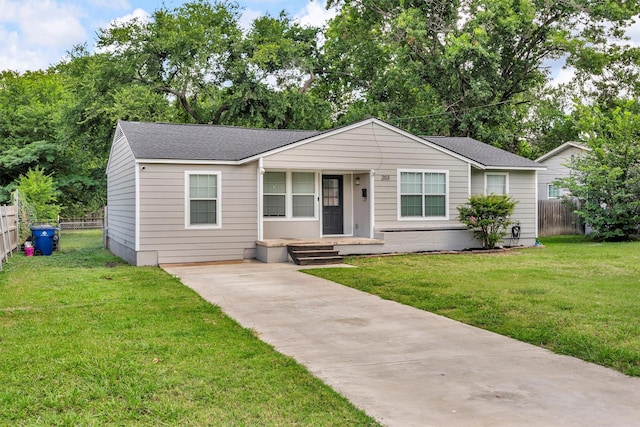 203 Olive St, Waxahachie, TX 75165 - view of front of property featuring a shingled roof and driveway