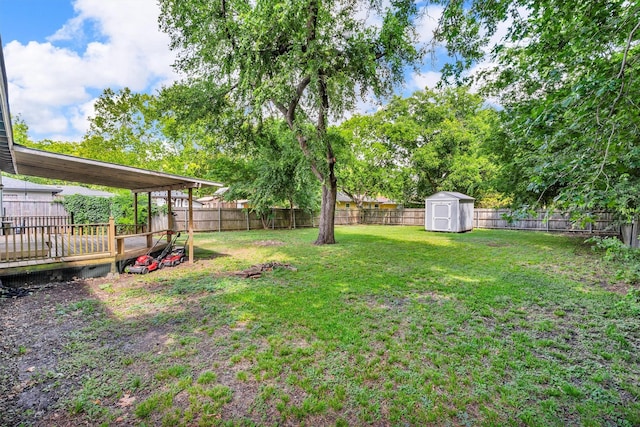 203 Olive St, Waxahachie, TX 75165 - fenced backyard with a storage unit and a wooden deck