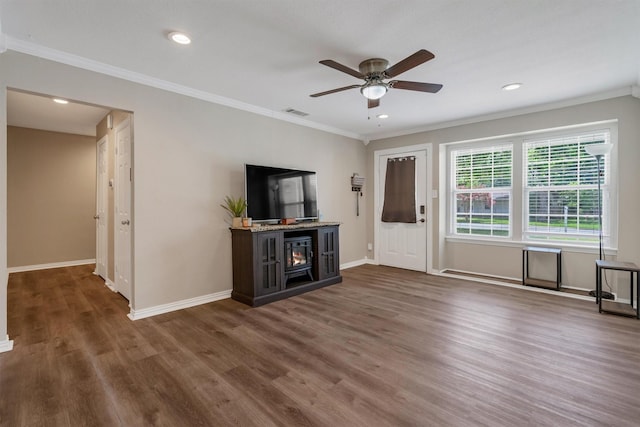 203 Olive St, Waxahachie, TX 75165 - unfurnished living room featuring wood finished floors, a ceiling fan, ornamental molding, recessed lighting, and a fireplace