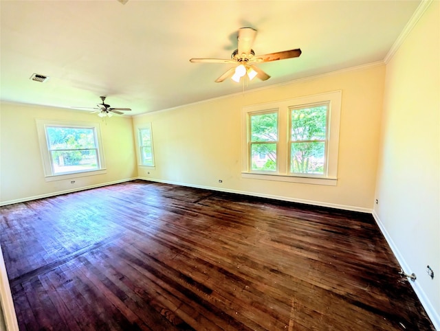 922 Ratcliff St, Shreveport, LA 71104 - empty room with ceiling fan, crown molding, dark wood-type flooring, and baseboards