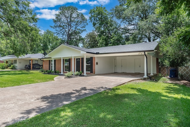 2869 Alkay Dr, Shreveport, LA 71118 - ranch-style home with concrete driveway, a carport, and brick siding