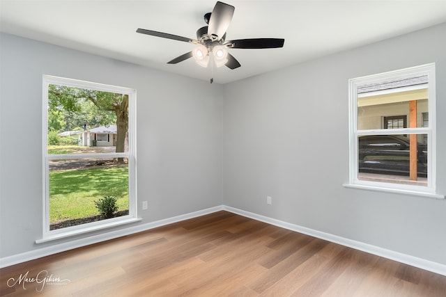 2869 Alkay Dr, Shreveport, LA 71118 - spare room featuring wood finished floors, a ceiling fan, and baseboards