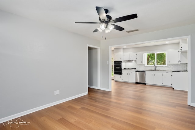 2869 Alkay Dr, Shreveport, LA 71118 - kitchen featuring dishwasher, a sink, backsplash, ceiling fan, and under cabinet range hood