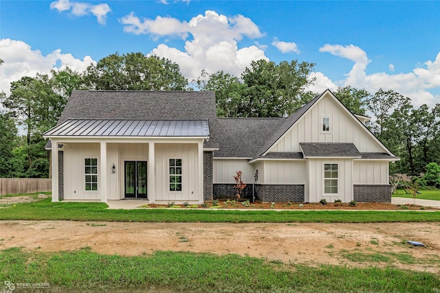 231 Ramsey, Stonewall, LA 71078 - modern inspired farmhouse featuring roof with shingles and board and batten siding