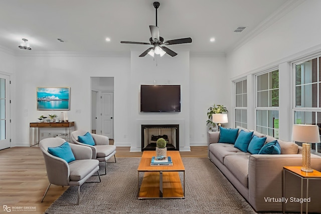 231 Ramsey, Stonewall, LA 71078 - living room with light wood-type flooring, ornamental molding, a ceiling fan, recessed lighting, and a fireplace