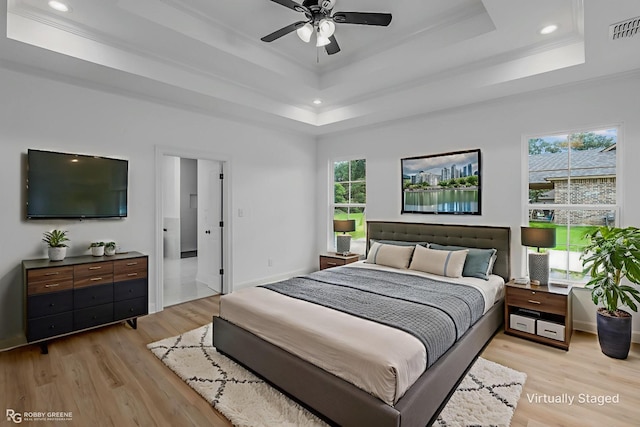 231 Ramsey, Stonewall, LA 71078 - bedroom featuring a tray ceiling, ornamental molding, light wood-style flooring, and recessed lighting