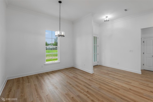 231 Ramsey, Stonewall, LA 71078 - unfurnished room featuring ornamental molding, light wood-type flooring, and a chandelier