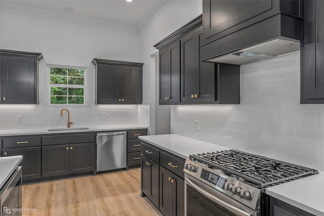231 Ramsey, Stonewall, LA 71078 - kitchen featuring stainless steel appliances, decorative backsplash, light countertops, and crown molding