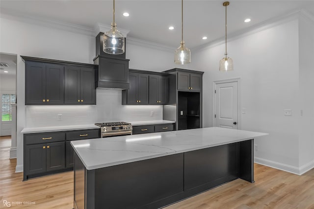 231 Ramsey, Stonewall, LA 71078 - kitchen with gas range, backsplash, light wood-style flooring, crown molding, and light stone counters