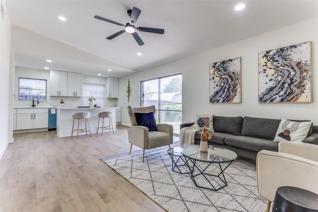 806 Brookshire Cir, Garland, TX 75043 - living area featuring lofted ceiling, ceiling fan, light wood finished floors, and recessed lighting