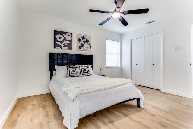 806 Brookshire Cir, Garland, TX 75043 - bedroom with wood finished floors, baseboards, a closet, and ceiling fan