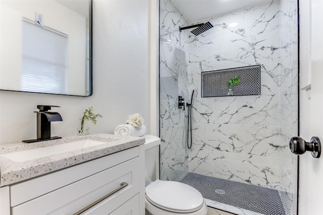 806 Brookshire Cir, Garland, TX 75043 - full bathroom with vanity, toilet, and a marble finish shower