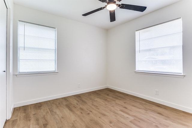 806 Brookshire Cir, Garland, TX 75043 - unfurnished room featuring light wood-type flooring and baseboards