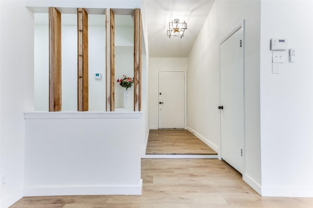 806 Brookshire Cir, Garland, TX 75043 - corridor with light wood finished floors and baseboards