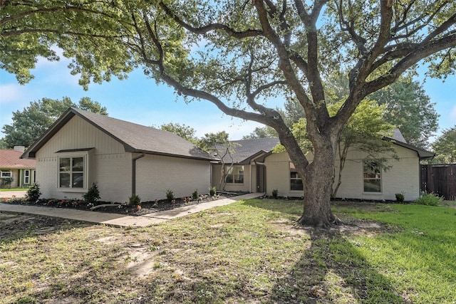 520 Oakcrest Dr, Coppell, TX 75019 - view of front of home featuring brick siding and roof with shingles