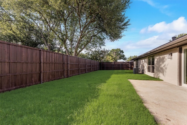 520 Oakcrest Dr, Coppell, TX 75019 - view of yard with central AC unit and a patio area