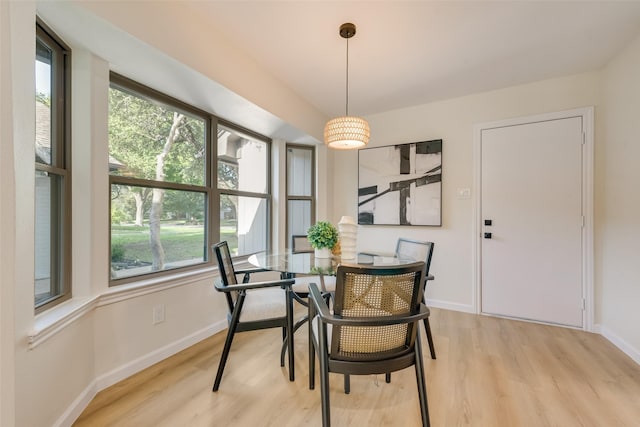 520 Oakcrest Dr, Coppell, TX 75019 - dining area featuring plenty of natural light, light wood finished floors, and baseboards