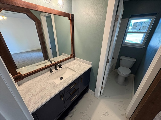 6805 Eagle Rock Dr, Fort Worth, TX 76133 - bathroom with marble finish floors, vanity, baseboards, toilet, and ceiling fan