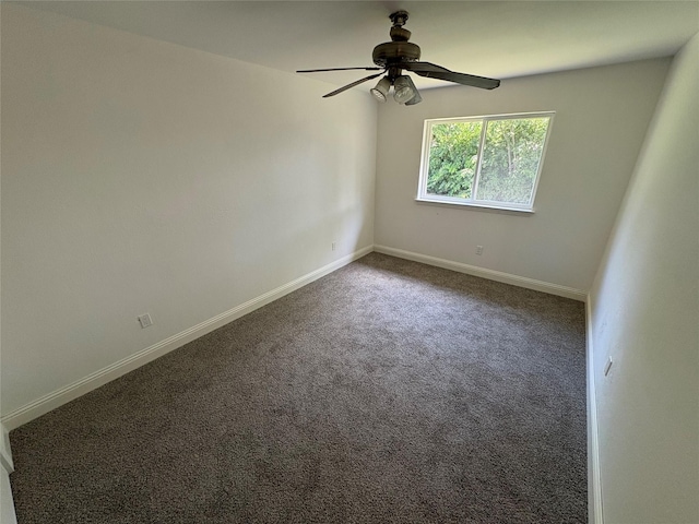 6805 Eagle Rock Dr, Fort Worth, TX 76133 - unfurnished room with a ceiling fan, dark colored carpet, and baseboards