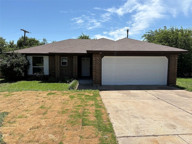 6805 Eagle Rock Dr, Fort Worth, TX 76133 - ranch-style house featuring brick siding, a garage, concrete driveway, and a front yard