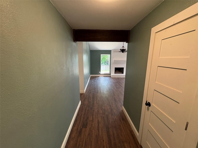 6805 Eagle Rock Dr, Fort Worth, TX 76133 - corridor with dark wood-style flooring, baseboards, and a textured wall
