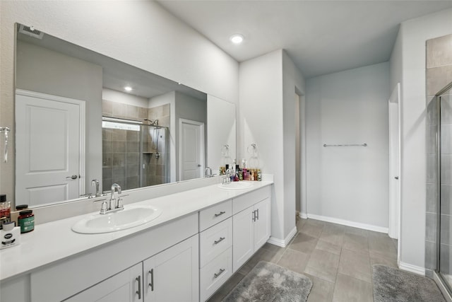 5637 Castle Peak Bnd, Fort Worth, TX 76126 - full bath with double vanity, a stall shower, recessed lighting, and baseboards