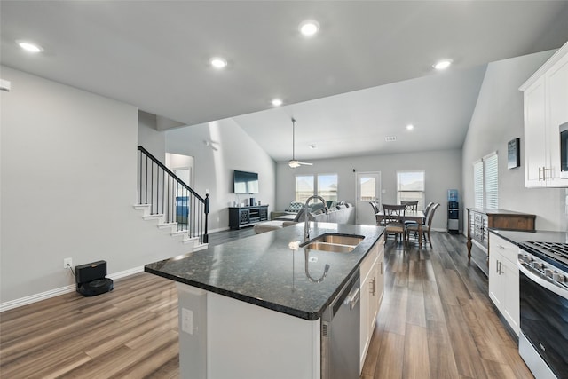 5637 Castle Peak Bnd, Fort Worth, TX 76126 - kitchen featuring a sink, stainless steel appliances, ceiling fan, wood finished floors, and baseboards