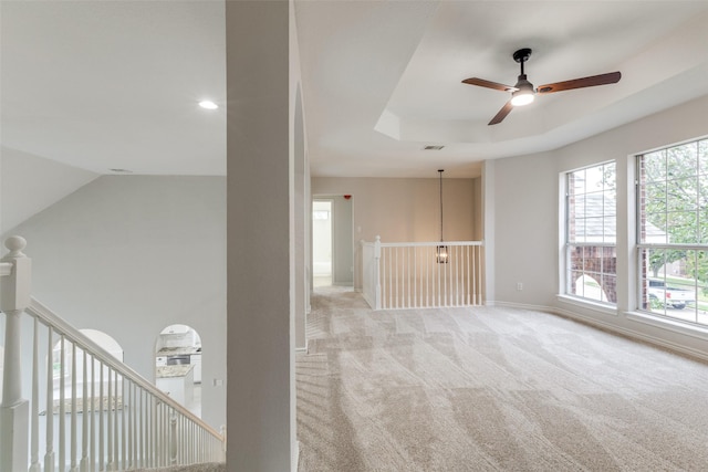 5312 Bellis Dr, Fort Worth, TX 76244 - carpeted empty room with ceiling fan, baseboards, and a tray ceiling