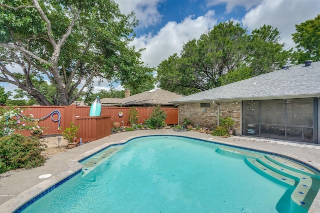 1520 Papeete Dr, Plano, TX 75075 - view of swimming pool with a fenced backyard