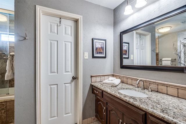 1520 Papeete Dr, Plano, TX 75075 - full bathroom with vanity, a textured wall, a shower, and toilet